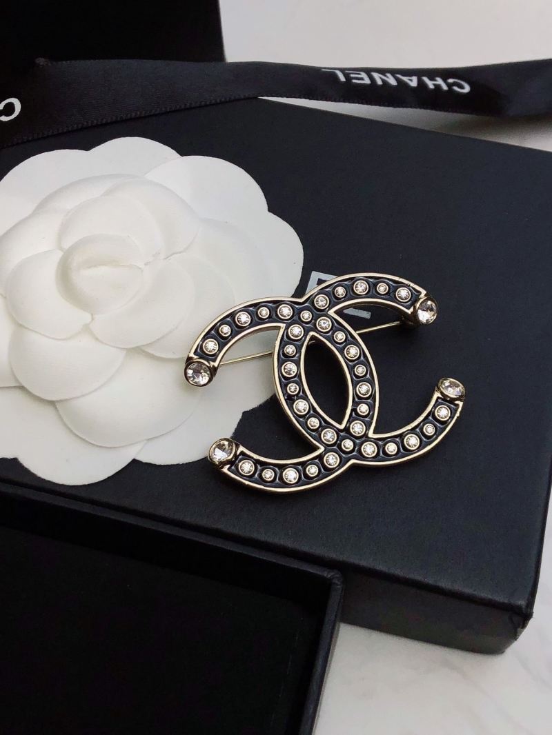 Ch**el brooches